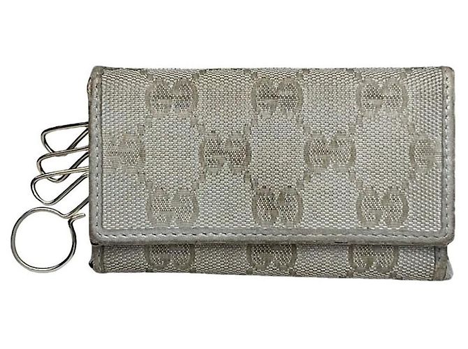 Pochette en cuir argenté Gucci GG Blooms