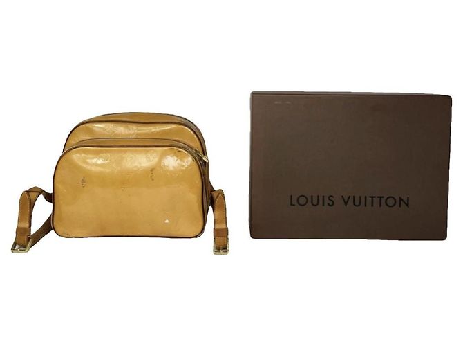 Louis Vuitton Artsy Yellow Leather Backpack