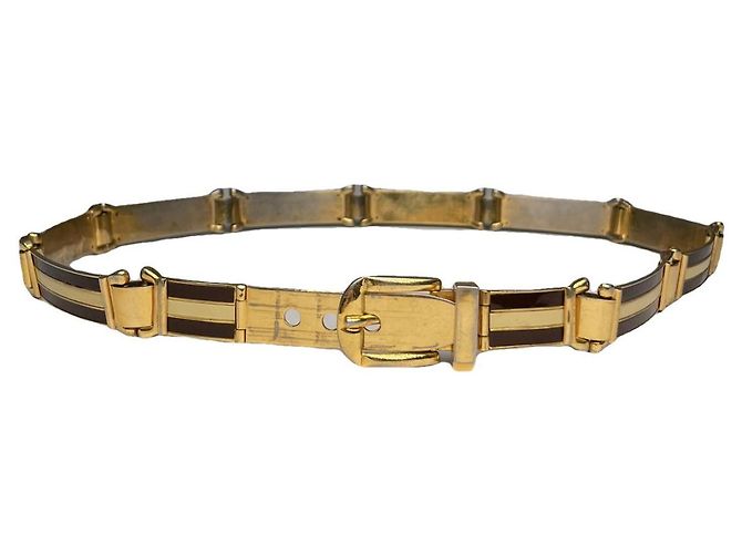 Cinturón de metal dorado Gucci