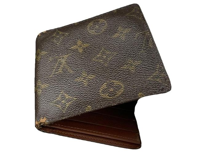 Bolsa de couro marrom Louis Vuitton Flore