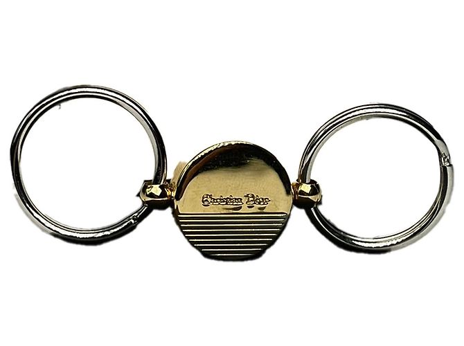 Pingente de aço dourado Dior
