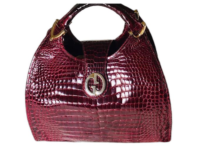 Bolsa Gucci em couro de crocodilo vermelha Vermelho