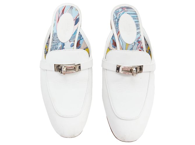 Kelly Mules mit Drehverschluss aus Kalbsleder von Hermès Weiß