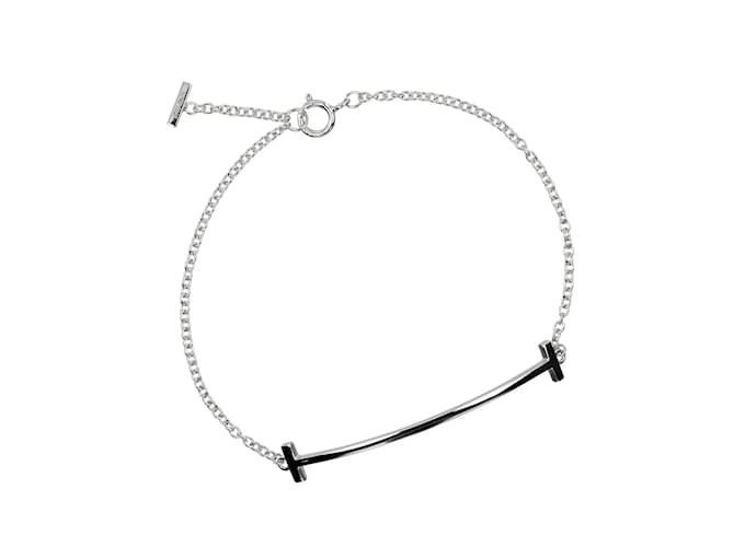 Tiffany & Co Pulseira charm sorriso Tiffany T Ouro branco  ref.2068399