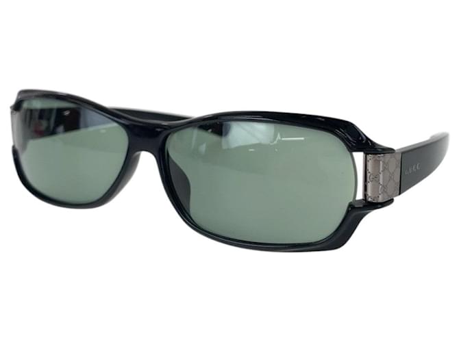 Óculos de sol Gucci padrão GG preto com hardware prateado Plástico  ref.2069058