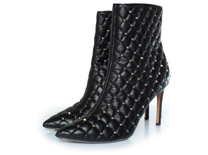 Botas de tornozelo rockstud spike de Valentino Garavani Preto Dourado