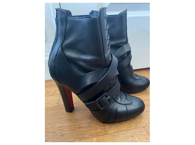 Black heeled ankle boots with belt strap Christian Louboutin  ref.2081668