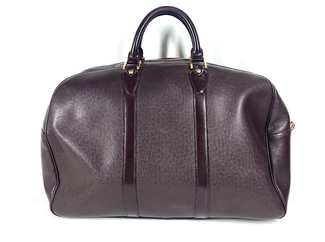 Bolsa Kendall PM Taiga Louis Vuitton Marrom