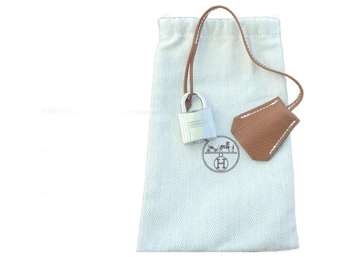 Hermès new bell, pull tab, and lock for strap top Camel