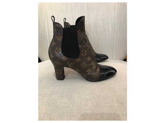 Botas Louis Vuitton T.37,5 Marrom