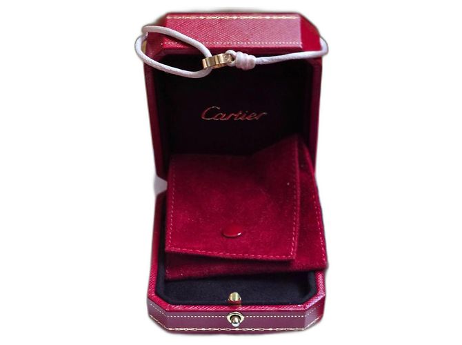 Pulsera Cartier Love de oro con cordón de seda. Dorado