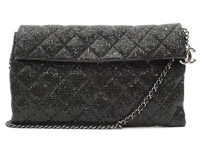 Pochette Chanel WOC in tessuto glitter e pelle nera Nero