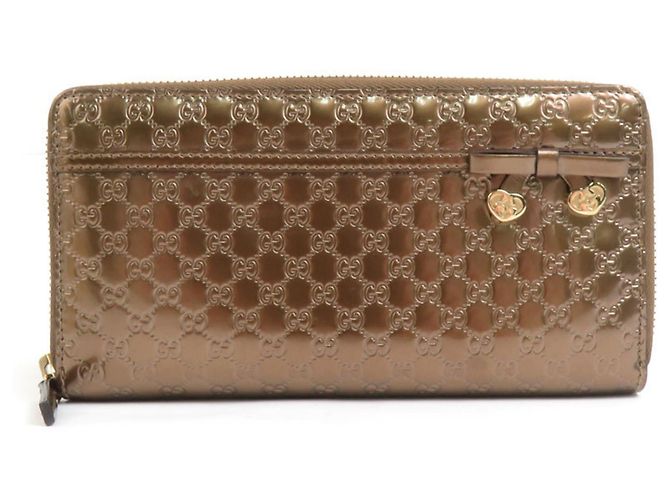 Cartera larga de cuero bronce Gucci