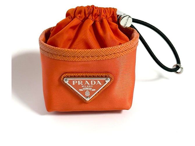 Charm de bolso Prada, estuche para auriculares, llavero