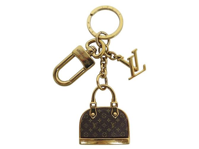 LOUIS VUITTON KEYCHAIN ALMA MONOGRAM M01799 BAG KEY RING Golden