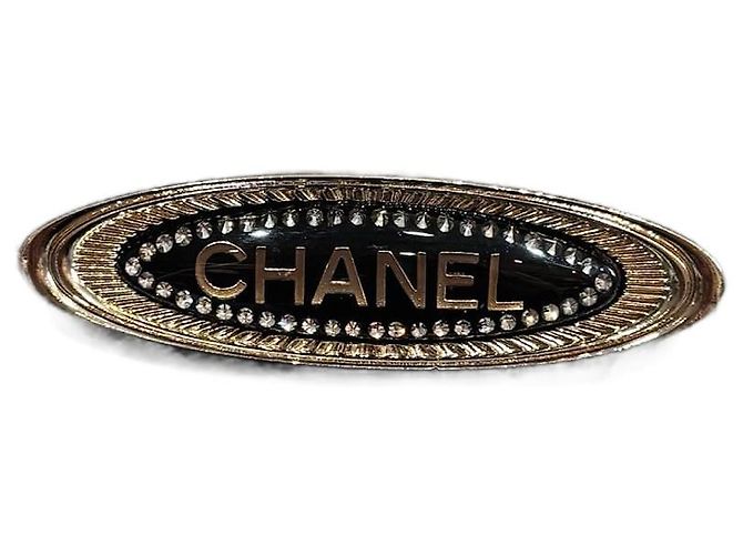 Broche Chanel dorée