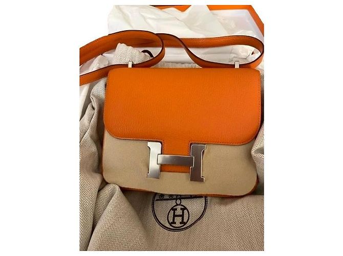 Hermès Constance mini cuero de cabra naranja
