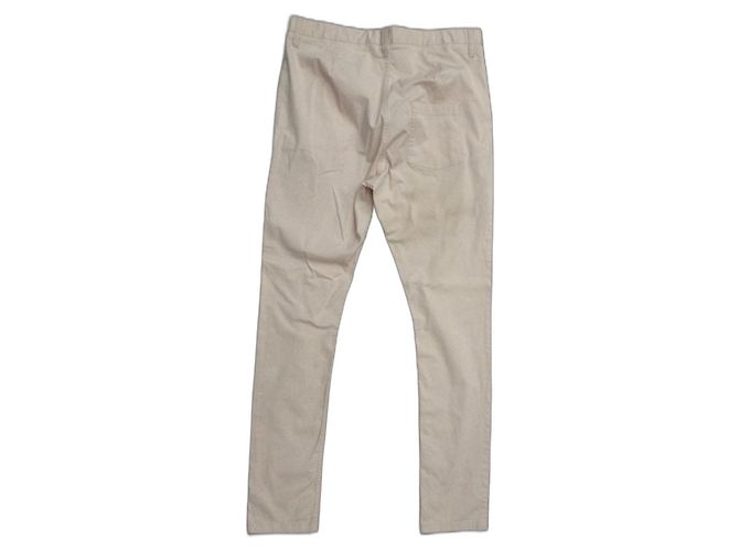 Pantalones Acne beige de algodón