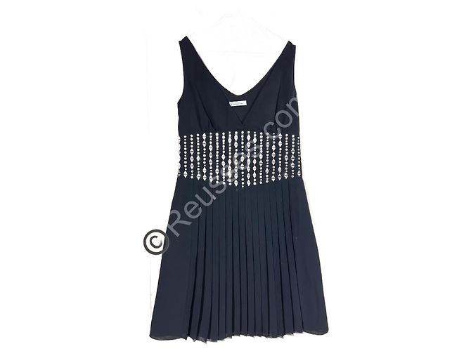 Vestido negro plisado Versace. Colección