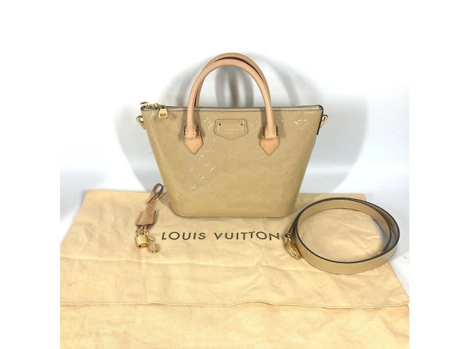 Bolsa Montebello PM em Monogram Vernis Louis Vuitton Bege