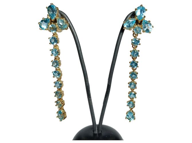 Autre Marque Pendientes largos de topacios azules de oro 18K