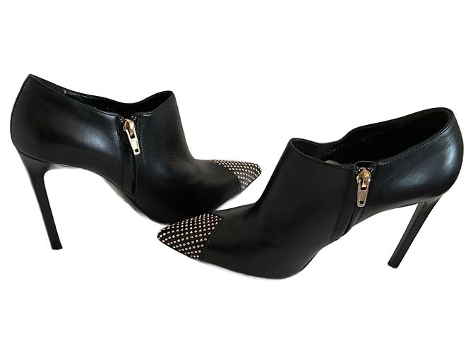 Saint Laurent Palladio black leather ankle boots with gold studs Golden