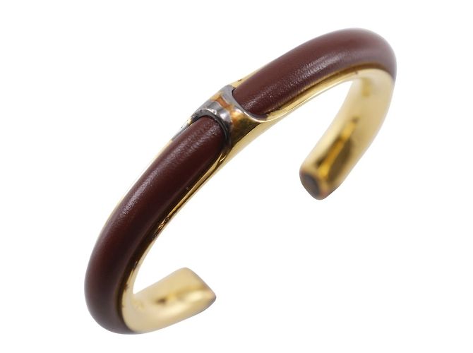 Hermès Pulseira de couro e banhada a ouro Hermes Marrom Dourado 