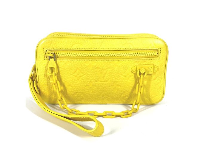 Pochette Volga en Monogram Empreinte de Louis Vuitton Jaune