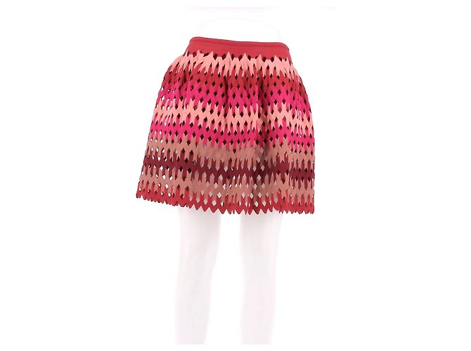 Falda corta de encaje roja y rosa Alaïa