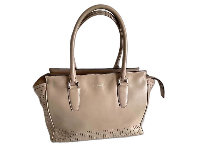 Bolsa de mão Coach em couro bege