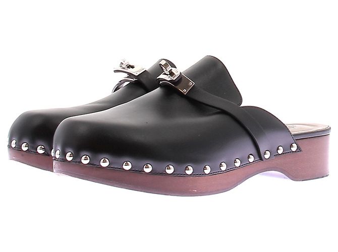 Kelly Hermès Schwarze Clogs "Carlotta"
