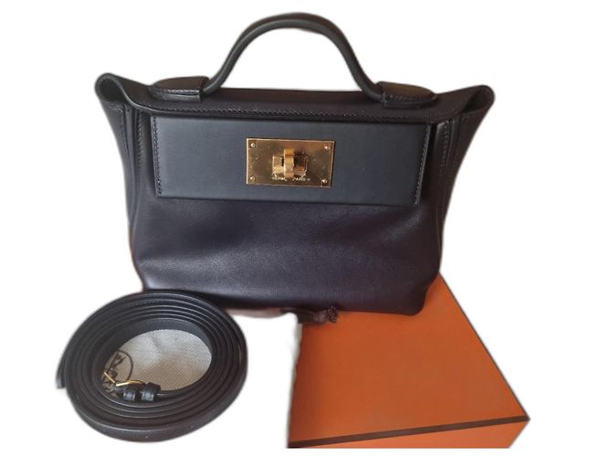 Acapulco Hermès 24/24 Mini Swift Leder Handtasche Schwarz Gold