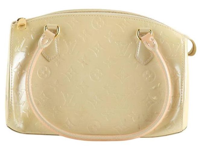 Louis Vuitton Sac à main Sherwood en cuir jaune