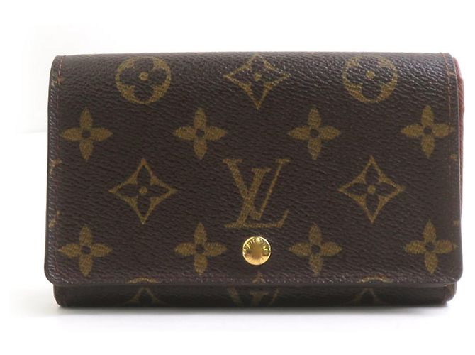 Billetera bi-fold Louis Vuitton en monograma marrón Castaño