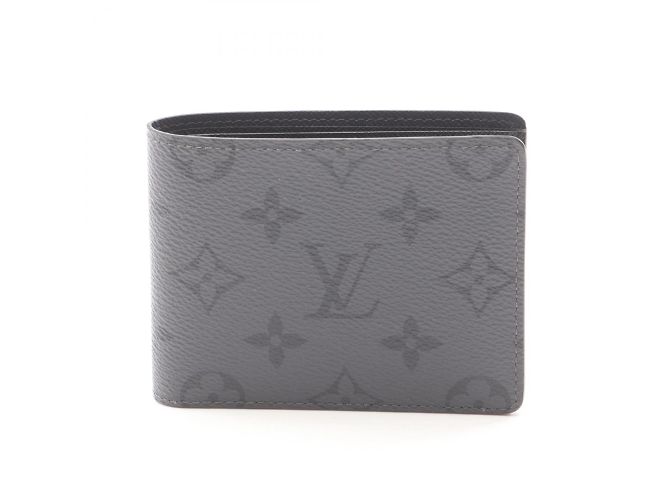 Cartera Slender Monogram Eclipse Reverse Bi-fold de Louis Vuitton Castaño