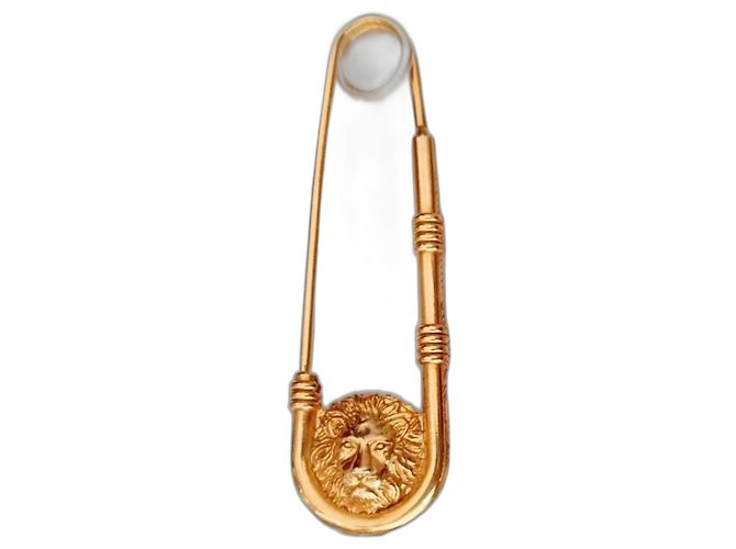 broche VERSACE banhado a ouro