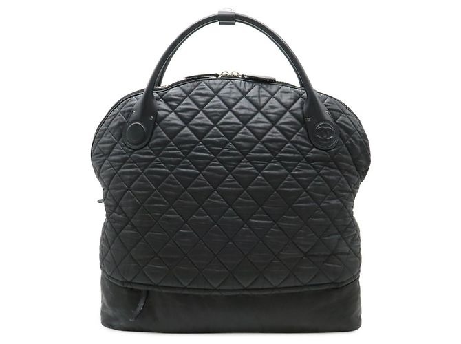 Bolso Boston de cuero Coco Cocoon de Chanel Negro Burdeos