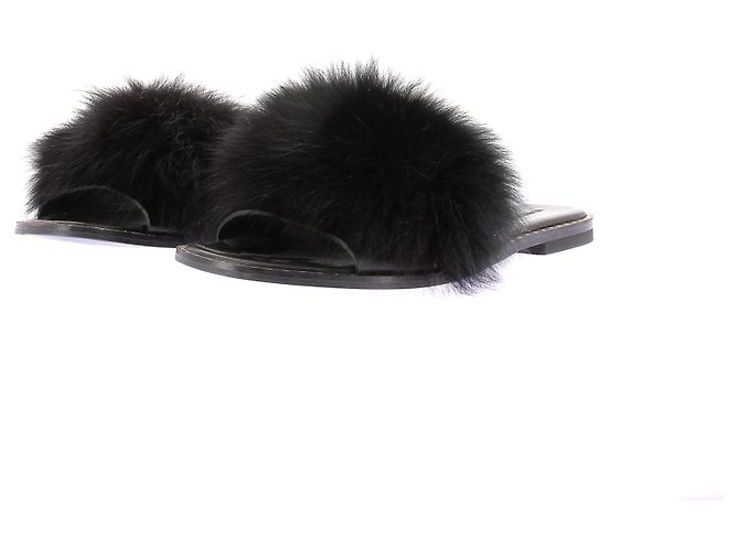 Autre Marque Flache Mules aus Kunstfell Schwarz