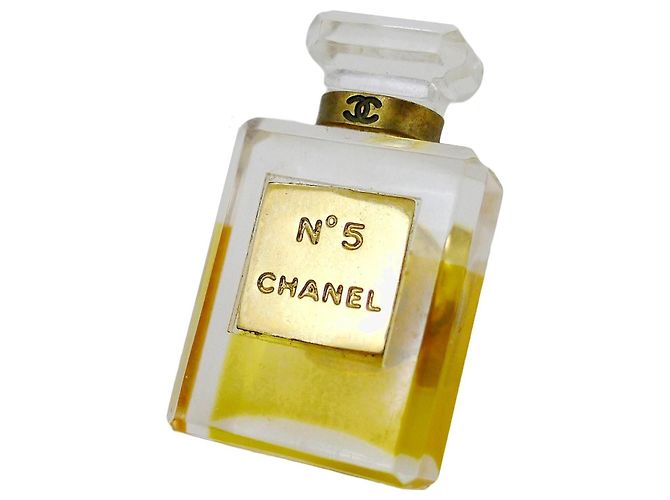 Broche Chanel Nº5 frasco de perfume dourado