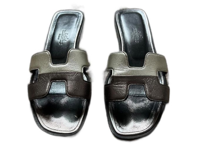 Sandali Hermès in agnello argento e grigio scuro Grigio antracite