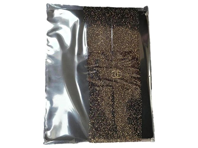 Collant Chanel in nylon nero e oro D'oro