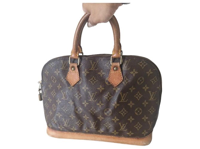 Alma Bolsa Louis Vuitton de couro marrom