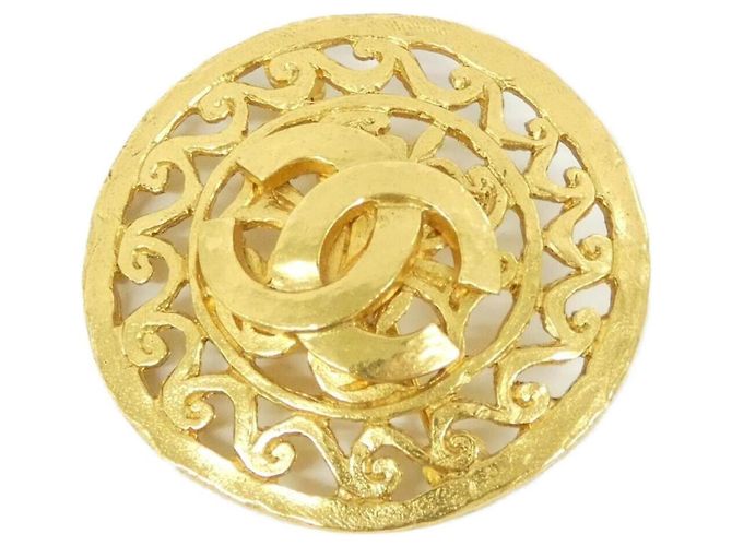 Broche Chanel dorado
