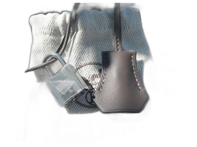 Zíper, sininho e cadeado Hermès em couro swift cinza com dustbag