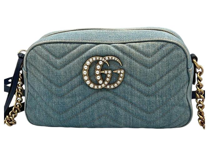 Bolsa transversal Gucci GG Marmont em denim azul acolchoado