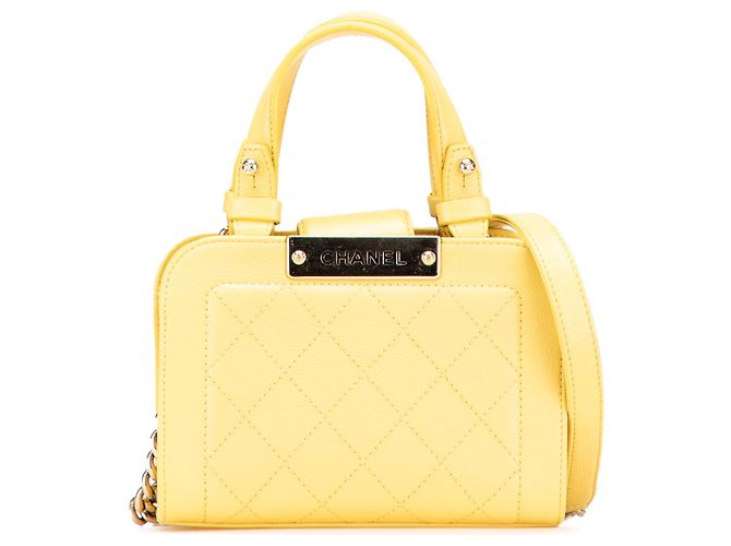 Bolsa de compras Chanel Mini em couro de bezerro amarelo com etiqueta Click