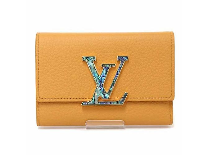Portefeuille compact tri-fold Capucines de Louis Vuitton Doré Orange Jaune