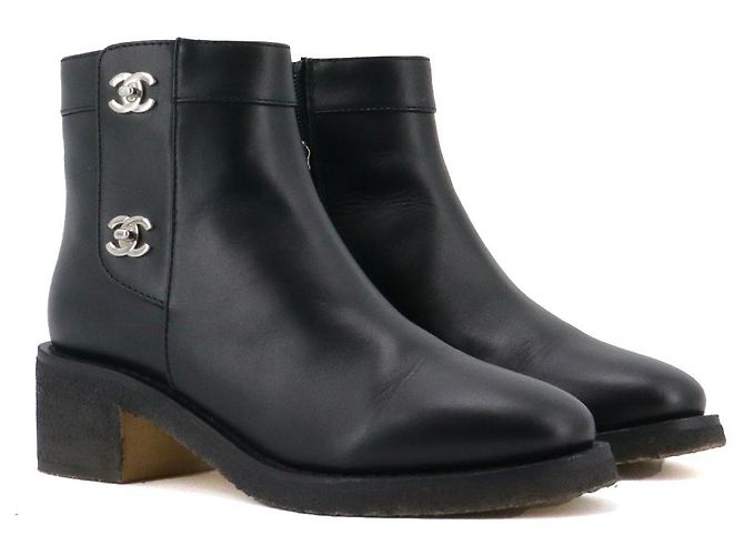 CHANEL - Chanel CC ankle boots in black leather (size 37)