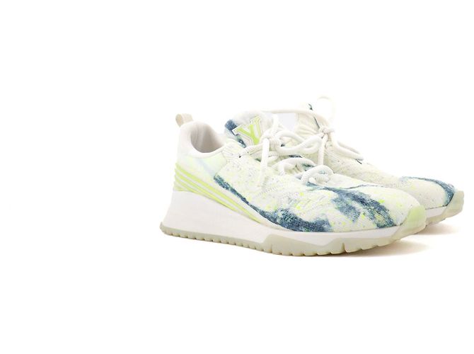 LOUIS VUITTON - Baskets Louis Vuitton en toile blanche (T41)
