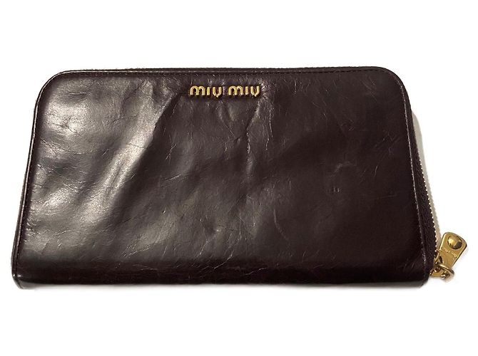Cartera Miu Miu de piel de pelo rojo oscuro morado oscuro Burdeos